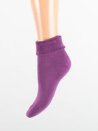 Calza con polsino taglio laser risvolto da donna