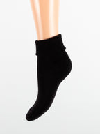 Calza con polsino taglio laser risvolto da donna
